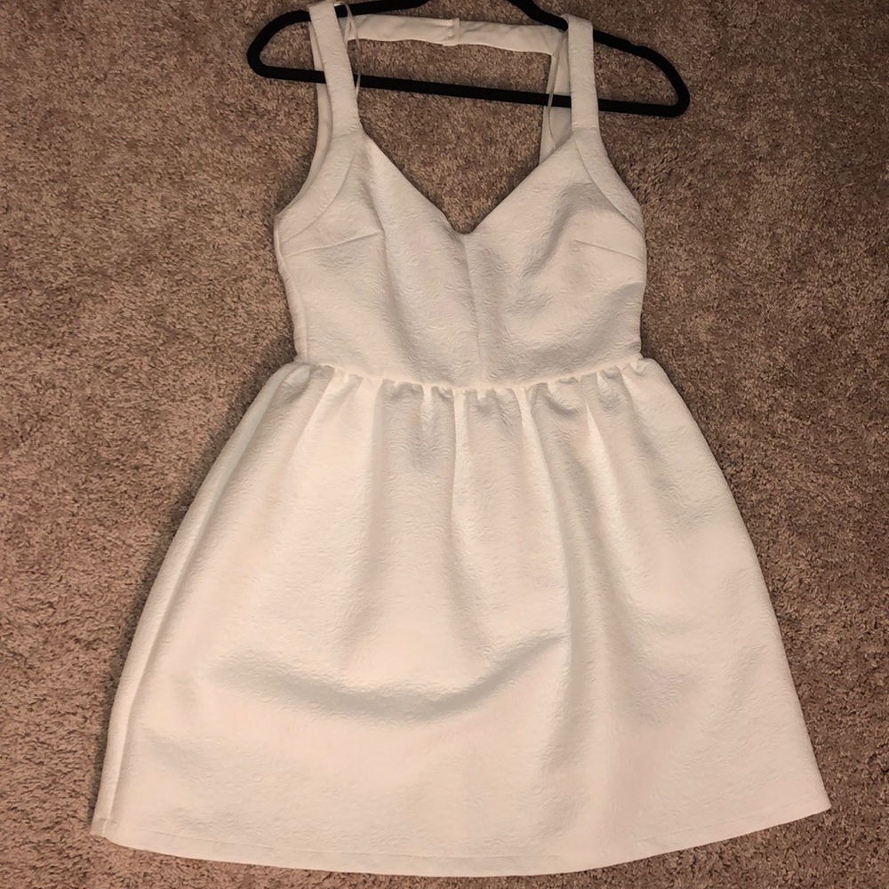 Low back white mini dress